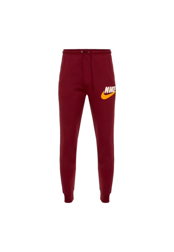 Spodnie męskie Nike Club Fleece Joggers. Kolor: czerwony