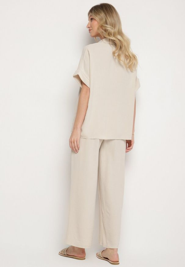 Born2be - Jasnobeżowy Komplet Koszula z Krótkim Rękawem i Szerokie Spodnie Maralissa. Kolor: beżowy