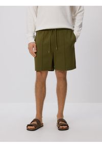 Reserved - Szorty comfort z przeszyciami - jasny zielony. Kolor: zielony. Materiał: bawełna, dzianina
