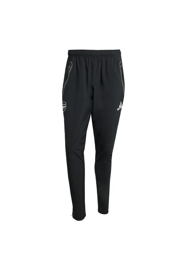 Adidas - Spodnie Arsenal Tiro 25 Competition Vis Tech Travel. Kolor: czarny. Materiał: dresówka. Sport: piłka nożna