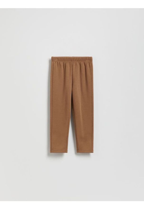Reserved - Spodnie z ociepleniem - brązowy. Kolor: brązowy. Materiał: bawełna, dzianina
