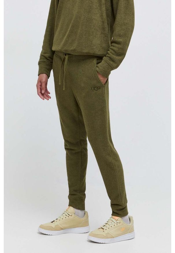 Ugg - UGG spodnie dresowe kolor zielony gładkie. Kolor: zielony. Materiał: dresówka. Wzór: gładki