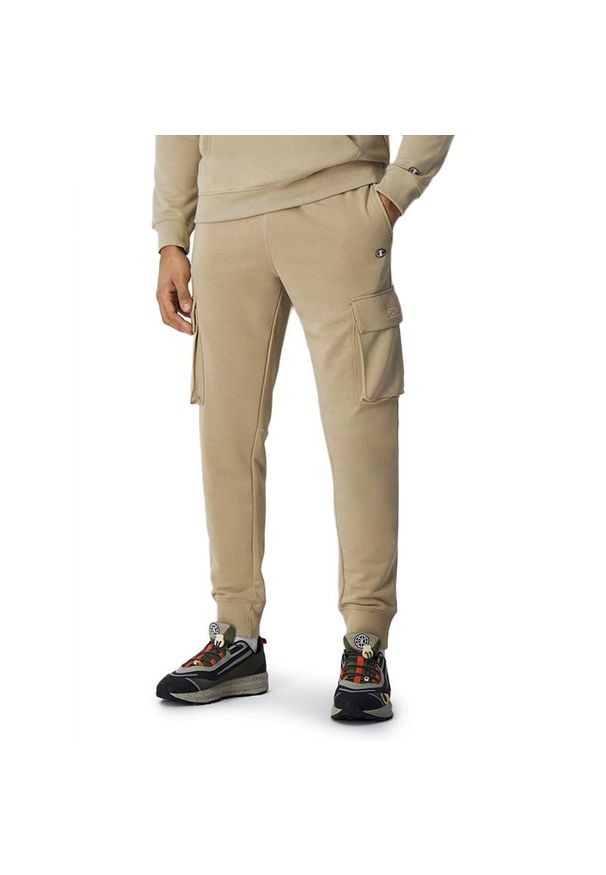 Spodnie Champion C Logo Cargo Joggers 219898-YS073 - beżowe. Kolor: beżowy. Materiał: bawełna, poliester, dresówka. Wzór: haft