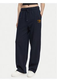 TOMMY HILFIGER - Tommy Hilfiger Spodnie dresowe Logo Exaggerated Seam WW0WW50783 Granatowy Relaxed Fit. Kolor: niebieski. Materiał: bawełna #1