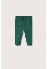 Mango Kids spodnie dresowe dziecięce Mateo kolor zielony gładkie. Kolor: zielony. Materiał: dresówka. Wzór: gładki