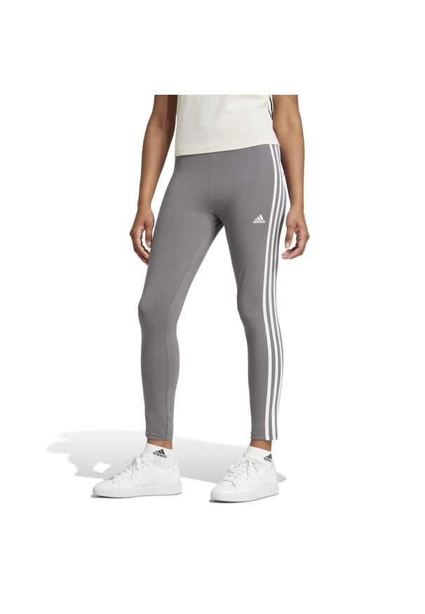 Adidas - Legginsy fitness damskie ADIDAS. Stan: podwyższony. Kolor: szary. Materiał: bawełna, elastan, materiał. Wzór: paski. Sport: fitness