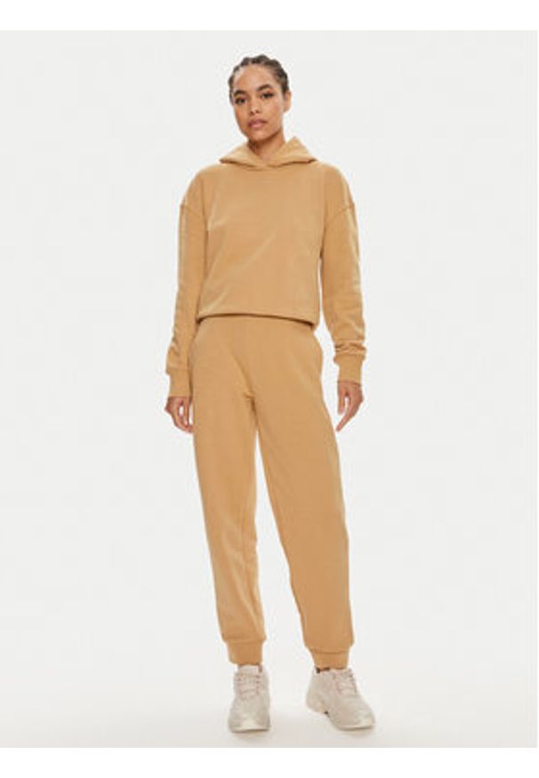 Calvin Klein Spodnie dresowe Nano Logo K20K207214 Beżowy Relaxed Fit. Kolor: beżowy. Materiał: bawełna