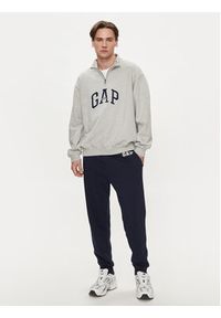 GAP - Gap Spodnie dresowe 868463-01 Granatowy Regular Fit. Kolor: niebieski. Materiał: bawełna