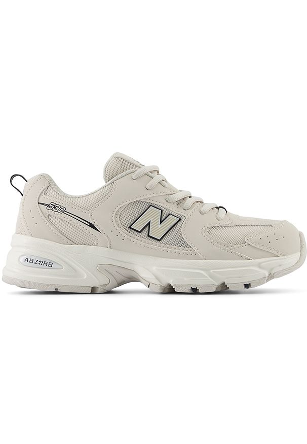 Buty dziecięce New Balance GR530SC1 – beżowe. Okazja: na uczelnię. Kolor: beżowy. Materiał: materiał, guma, syntetyk. Szerokość cholewki: normalna