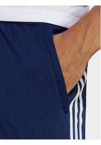 Adidas - adidas Spodnie dresowe Train Essentials 3-Stripes Training IB8169 Niebieski Regular Fit. Kolor: niebieski. Materiał: dresówka, syntetyk