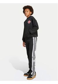 Adidas - adidas Spodnie dresowe Adibreak JX1091 Czarny Regular Fit. Kolor: czarny. Materiał: syntetyk