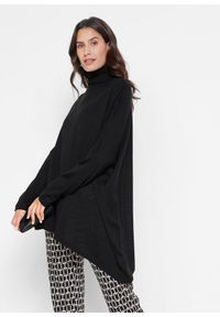 bonprix - Sweter poncho z golfem i asymetryczną linią dołu. Typ kołnierza: golf. Kolor: czarny #1