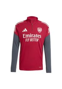 Adidas - Koszulka treningowa Arsenal Tiro 25 Competition. Kolor: czerwony, brązowy, wielokolorowy, szary. Materiał: dresówka. Sport: piłka nożna