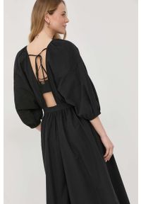 TwinSet - Twinset sukienka bawełniana kolor czarny maxi rozkloszowana. Kolor: czarny. Materiał: bawełna. Długość rękawa: krótki rękaw. Długość: maxi