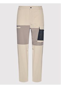 New Balance Spodnie materiałowe MP21502 Beżowy Relaxed Fit. Kolor: beżowy. Materiał: syntetyk, materiał #5