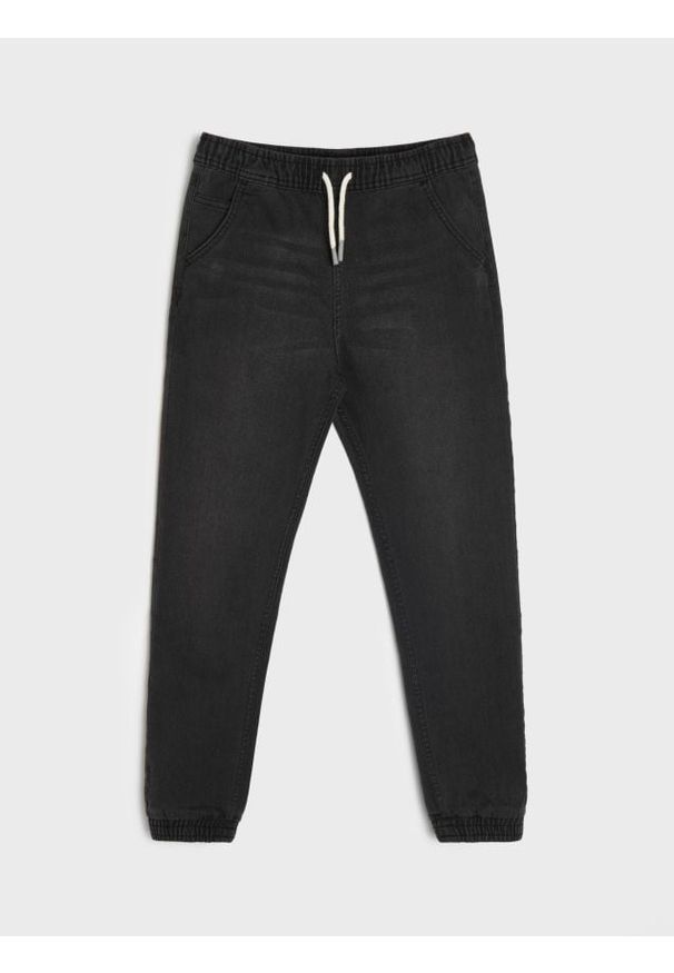 Sinsay - Jeansy jogger z efektem sprania - czarny. Kolor: czarny