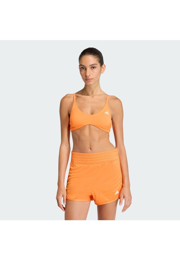 Adidas - Biustonosz Optime Essentials Workout Light Support. Kolor: żółty, pomarańczowy, wielokolorowy. Technologia: ClimaCool (Adidas). Sport: fitness