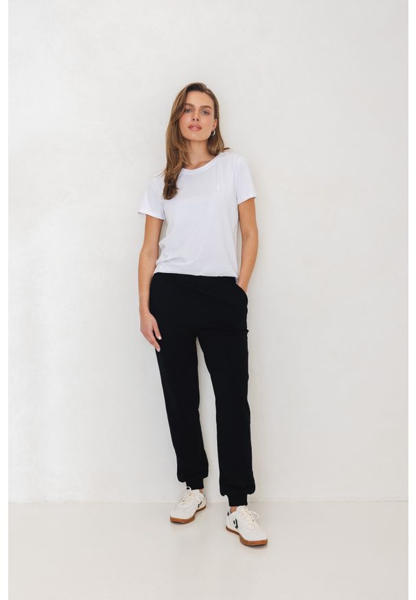 SPODNIE JOGGERS CZARNE XL - Flawless. Kolor: czarny. Materiał: materiał, skóra, dresówka, bawełna. Sport: joga i pilates