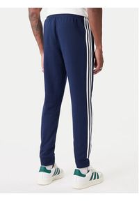 Adidas - adidas Spodnie dresowe 3-Stripes KE3561 Granatowy Slim Fit. Kolor: niebieski. Materiał: syntetyk, bawełna #3