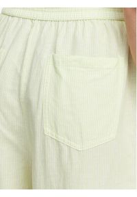 Tommy Jeans Spodnie materiałowe DW0DW22285 Zielony jasny Loose Fit. Kolor: zielony. Materiał: len #5