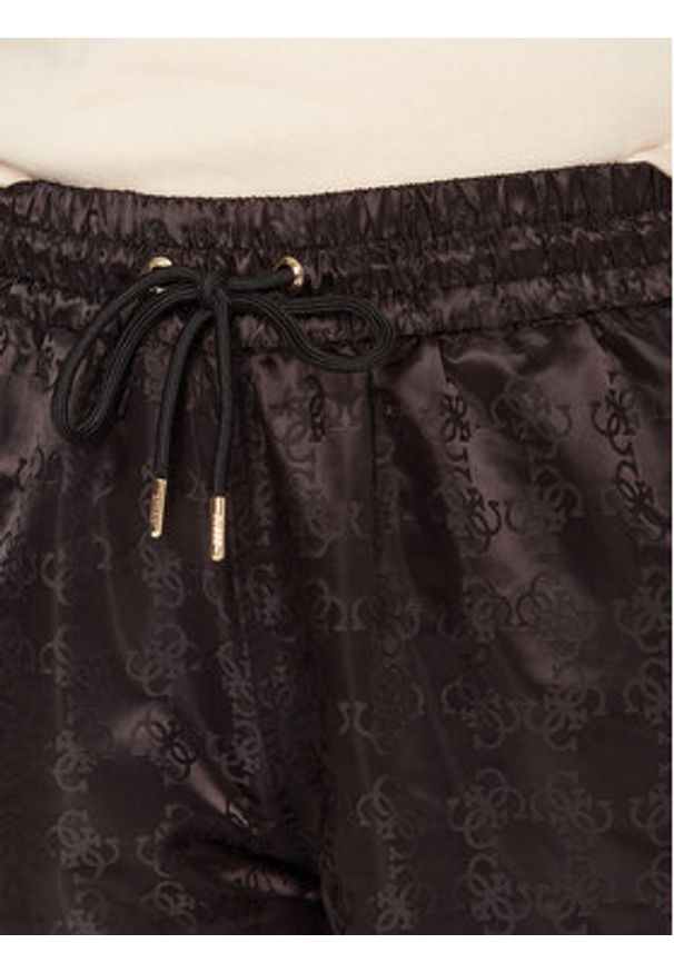 Guess Spodnie dresowe V5YB14 WHFU0 Czarny Regular Fit. Kolor: czarny. Materiał: syntetyk