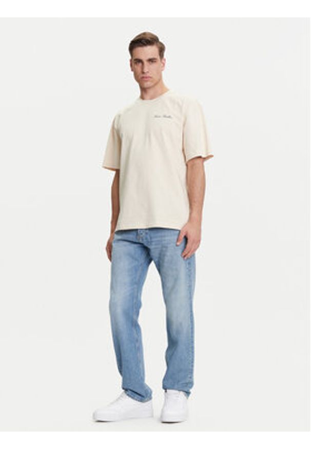 Karl Kani T-Shirt PD00005333 Beżowy Relaxed Fit. Kolor: beżowy. Materiał: bawełna