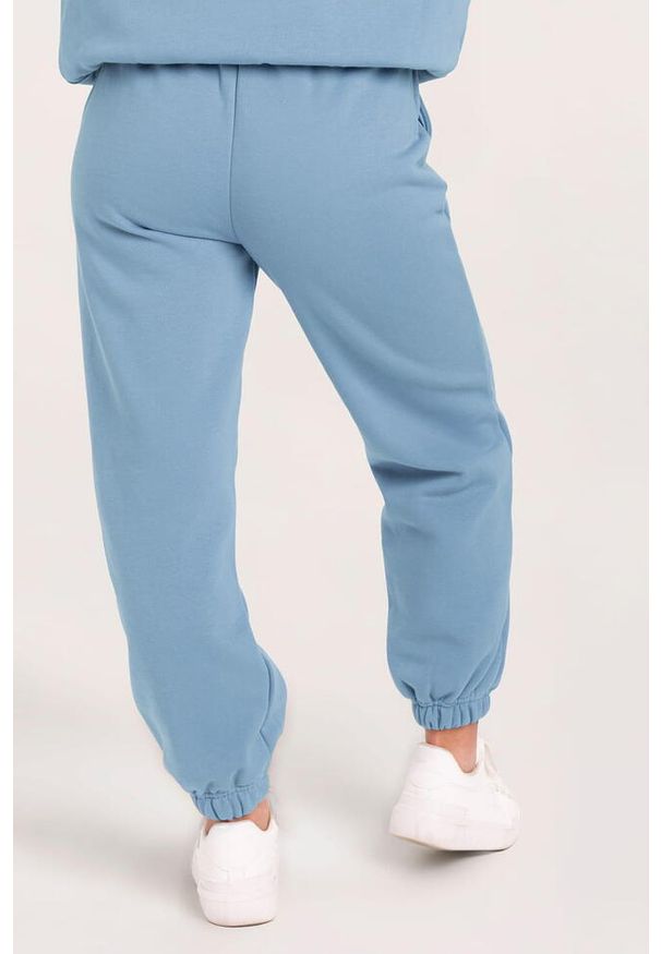 GYM GLAMOUR - Spodnie fitness damskie Gym Glamour dresowe. Kolor: niebieski. Materiał: dresówka. Sport: fitness
