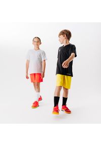 KIPSTA - Spodenki piłkarskie dla dzieci Kipsta Essential. Kolor: żółty. Materiał: poliester, materiał. Styl: sportowy