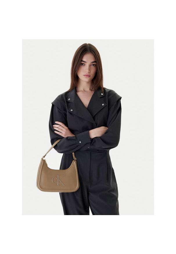Torebka Calvin Klein. Kolor: beżowy