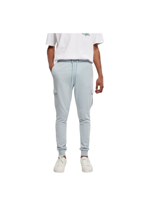 Dopasowane spodnie dresowe cargo Urban Classics. Kolor: niebieski. Materiał: dresówka