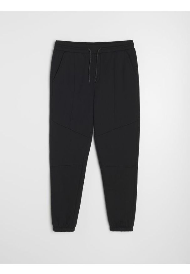 Sinsay - Spodnie jogger - czarny. Kolor: czarny