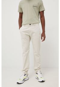 Tom Tailor spodnie męskie kolor beżowy proste. Kolor: beżowy. Materiał: materiał, bawełna