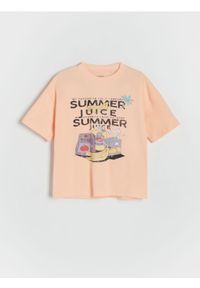 Reserved - T-shirt oversize z nadrukiem - brzoskwiniowy. Kolor: pomarańczowy. Materiał: bawełna, dzianina. Wzór: nadruk