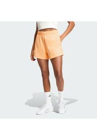 Adidas - adidas Szorty sportowe Soft Lux KA6998 Pomarańczowy Loose Fit. Kolor: pomarańczowy. Materiał: syntetyk #1