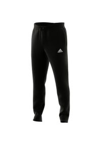 Adidas - Spodnie męskie adidas Essentials Tapered Cuff Pants. Kolor: czarny, biały, wielokolorowy. Sport: fitness