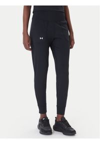 Under Armour Spodnie dresowe Motion 1375077 Czarny Slim Fit. Kolor: czarny. Materiał: syntetyk #1