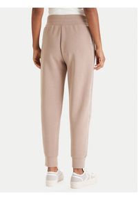 Guess Spodnie dresowe W6RB45 KBYE2 Beżowy Regular Fit. Kolor: beżowy. Materiał: syntetyk #2