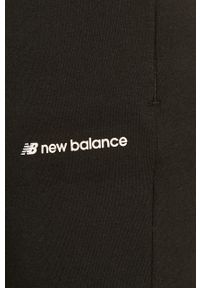 New Balance - Spodnie. Kolor: czarny. Materiał: bawełna, poliester, materiał, dzianina. Wzór: nadruk #3