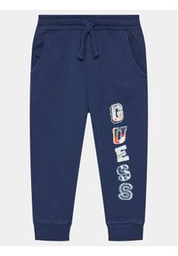 Guess Spodnie dresowe N4GQ11 KA6R3 Granatowy Regular Fit. Kolor: niebieski. Materiał: bawełna #1