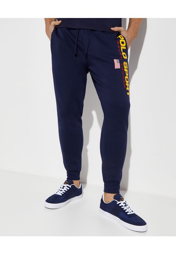 Ralph Lauren - RALPH LAUREN - Spodnie dresowe Jogger. Kolor: niebieski. Materiał: dresówka. Wzór: nadruk. Styl: sportowy