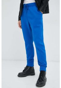 G-Star RAW - G-Star Raw spodnie dresowe kolor niebieski gładkie. Kolor: niebieski. Materiał: dresówka. Wzór: gładki #1
