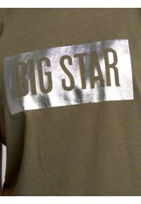 Big-Star - Koszulka dziewczęca z opalizującym nadrukiem khaki Oneidaska 303. Kolor: zielony. Materiał: jeans, bawełna, materiał. Wzór: nadruk. Styl: klasyczny