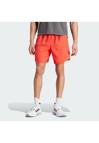 Adidas - Designed for Training Shorts. Kolor: czerwony. Sport: fitness