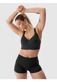 4f - 4F Legginsy krótkie z materiału z recyklingu damskie - czarne XL. Stan: podwyższony. Kolor: czarny. Materiał: materiał. Długość: krótkie. Wzór: gładki, jednolity, ze splotem. Sport: fitness, joga i pilates #1