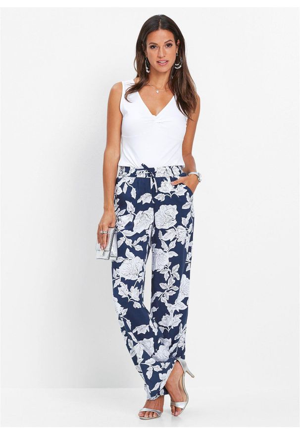 bonprix - Spodnie palazzo z lejącej wiskozy. Kolor: czarny. Materiał: wiskoza. Wzór: nadruk. Styl: elegancki