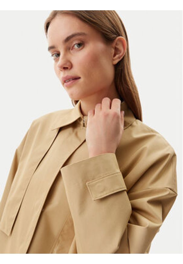 Calvin Klein Kurtka przejściowa K20K208379 Beżowy Relaxed Fit. Kolor: beżowy. Materiał: bawełna, syntetyk