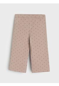 Sinsay - Jeansy z polarem wewnątrz w groszki - różowy. Kolor: różowy. Materiał: jeans, polar. Wzór: grochy