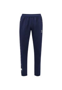 Spodnie sportowe do joggingu Hummel Move Grid. Kolor: niebieski. Materiał: dresówka. Styl: sportowy #1