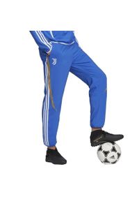 Spodnie piłkarskie męskie Adidas Juventus Turyn Trening Woven Pant. Kolor: niebieski, wielokolorowy, biały. Sport: piłka nożna, fitness