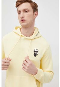 Karl Lagerfeld bluza 521900.705062 męska kolor żółty z kapturem z aplikacją. Okazja: na co dzień. Typ kołnierza: kaptur. Kolor: żółty. Materiał: materiał. Wzór: aplikacja. Styl: casual #3